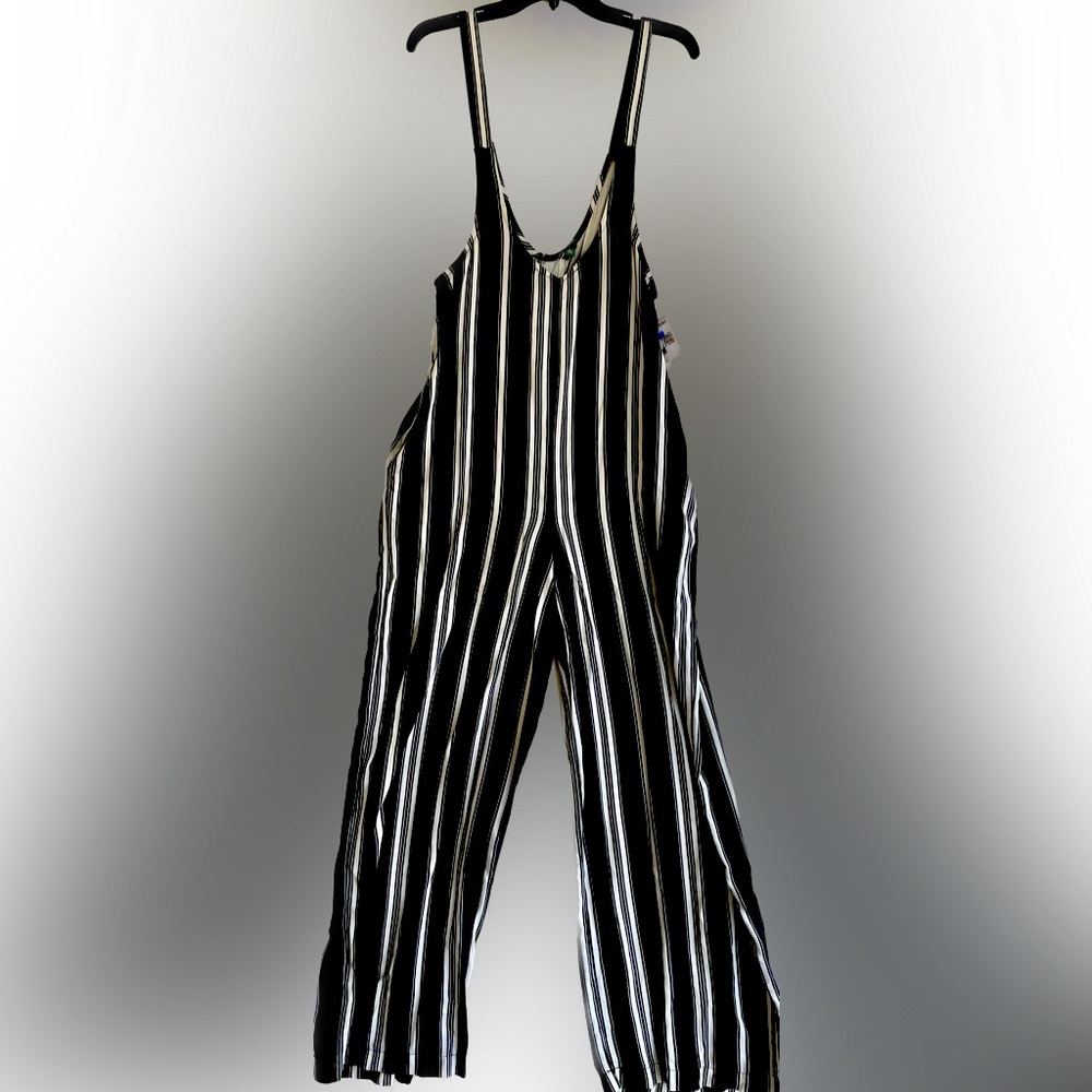 Fun and exciting pant suit. Size: medium. NWT